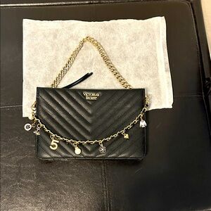 Victoria’s Secret bag with strap and small unbundled dust bag bundle